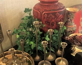 Collection of brass candlesticks