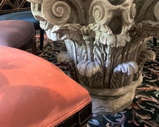 Heavy, ornate base for the round glass top table