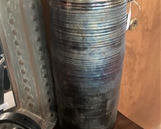 Raku pottery pitcher (Raku pottery is a traditional style of Japanese ceramics that uses low-temperature firing and features unique glaze effects.)