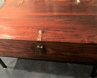 This handsome wooden chest makes a great coffee table . . . with great storage.