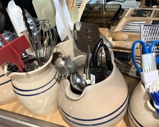 Pitchers of utensils