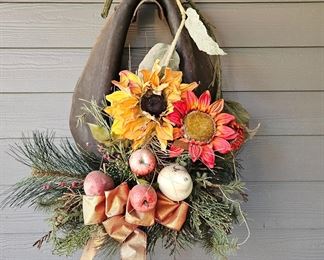 Antique horse collar with artificial flowers