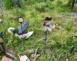 Assortment of lawn ornaments in front and back yard. 