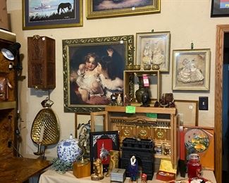 Antique LAMODE Paris fashion fabric dresses that are matted and framed, prayer alter cabinet, beautiful wood carved hanging wall lamp, numerous framed art pieces throughout the house