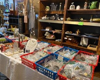 Several flats of jewelry, costume jewelry, several sealed containers filled with misc jewelry pieces. We also have some unique sterling pieces including a Harley Davidson sterling bracelet.