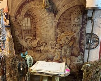 One of our several tapestries and look close to see iron candle stands