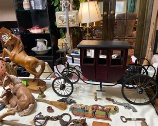 Stagecoach, Chinese carved monkey pod horse, Civil War handcuffs (no key)