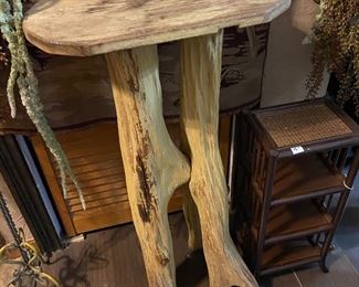 Beautiful hand crafted wood carved accent table and several other small tables and stands
