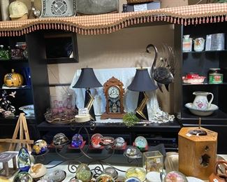 Collection of glass paperweights, pair of beautiful mid-century modern black and gold accent lamps, JACOT’s vintage clock
