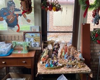 Nativity sets, three sewing machines, John Elway cardboard cut out