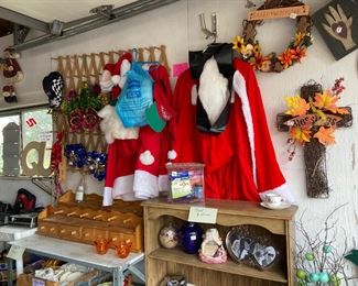 A couple Santa suits, wreaths and more wall hangings and lots more housewares in the garage
