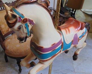 Small carousel horse approximately 30" tall and 32 " long