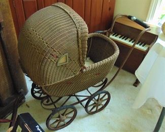 Wicker Stroller and child's toy piano (items sold separately)