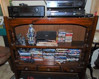 DVS, cassettes and other in a storage cabinet (Items sold separately)