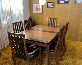 This is the dining room table and the six matching chairs.