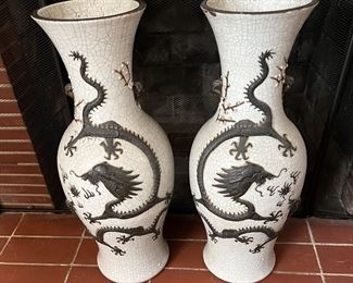 Here are a pair of matching Asian dragon vases.