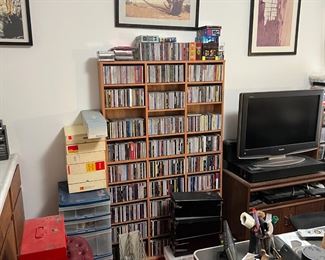 Below the framed artworks, the main feature here is the CD rack.