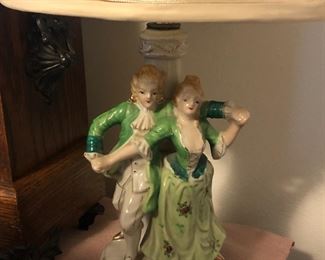 I have a pair of porcelain figuring lamps