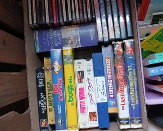 VHS tapes and DVD movies music CDs
