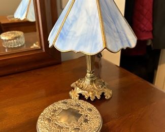 stained glass panel and brass desk lamp