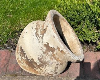 Tilted terracotta flower pots