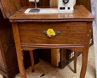 Vintage Japanese brand, "Riccar", sewing machine and sewing table.