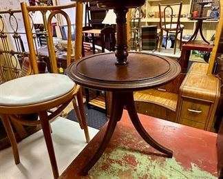 Two-tier stand plus miscellaneous furniture.