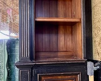 Bookshelf, left side that flanks the armoire shown in previous two pictures.  Stands a few inches shy of eight feet tall.  Mirrored right side bookshelf not pictured.