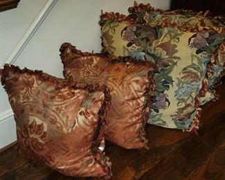 Many, many down filled accent pillows