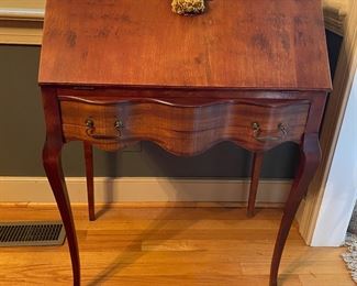 F1 - $150. Small secretary desk - beautiful shape. Measures 16" deep x 27" wide x 39.5" tall. 