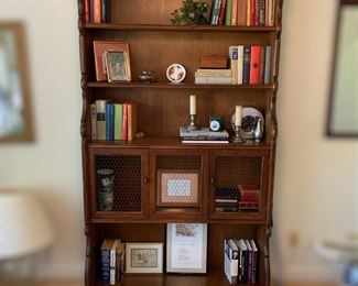 F8 - $150. Measures 15" deep x 44.5" wide x 87" tall. It is one piece and you will need 2 strong people to move! Can be used as a bookcase or display storage!