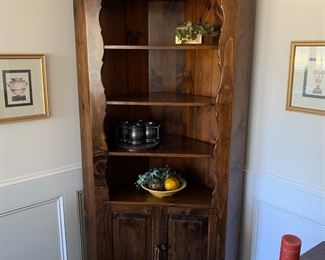 F35 - $175. Solid Wood corner cabinet with plate groove. Measures 32" out from each corner. 42" across the front. 80" tall. 