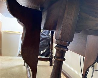 F15 - $125. Drop Leaf table with glass top for desk. Measures 18" (when folded) x 60" x 28" tall. Each leaf adds 12.5"