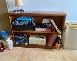 F16 - $25 Small Wooden bookcase. Measures 8" deep x 34" wide x 25.5" tall. 