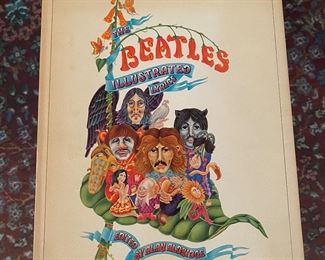 $30. The Beatles Illustrated Lyrics book. 
