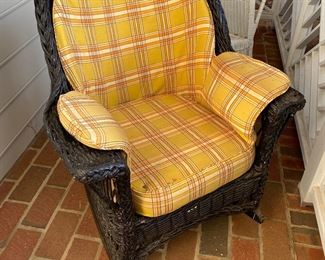 F59 - $125. Single Black wicker rocker - vintage cushions could use work. Has been stored indoors. 