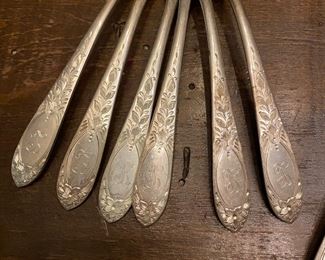 S1 - $1125. Small Set of Monogrammed "L" S. Kirk Sterling. 6 Knives. 4 soup spoons. 12 teaspoons. 6 Salad forks. 6 dinner forks1050 grams + 3 oz for knives.  4 Serving pieces 274 grams. 