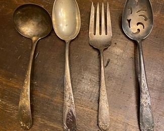S1 - $1125. Small Set of Monogrammed "L" S. Kirk Sterling. 6 Knives. 4 soup spoons. 12 teaspoons. 6 Salad forks. 6 dinner forks 1050 grams + 3 oz for knives.  4 Serving pieces 274 grams. 
