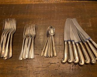 S2 - $1000. Stieff Sterling - no monogram. 8 salad forks, 8 dinner forks, 8 small spoons, 8 knives. 1128 grams + 4 oz. 