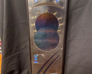 CH21 - $400 Tom McQuaid Art Glass Wall Hanging. Measures 7.25" wide x 20.25" tall. 