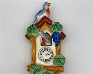 Lot 87 | VINTAGE WALL POCKET VASE COO COO CLOCK
