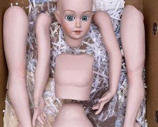 Lot 134 | ALBERTA’S MOLDS PORCELAIN BISQUE DOLL BODY PARTS
