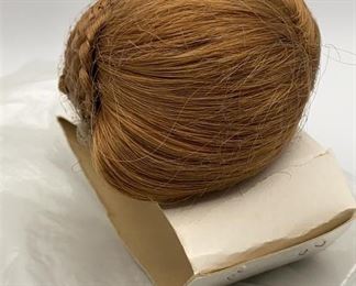 Lot 137 | NEW VINTAGE SYNTHETIC HAIR DOLL WIG
