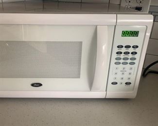 Lot 288 | OSTER KITCHEN MICROWAVE WHITE TESTED
