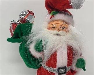 Lot 345 | ANNALEE CHRISTMAS SANTA 9IN DOLL W STAND
