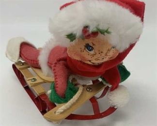 Lot 358 | ANNALEE CHILD ELF ON SLED DOLL CHRISTMAS

