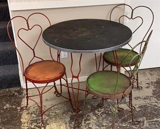 Lot 386 | WROUGHT IRON ICE CREAM PARLOR TABLE & 3 CHAIRS
