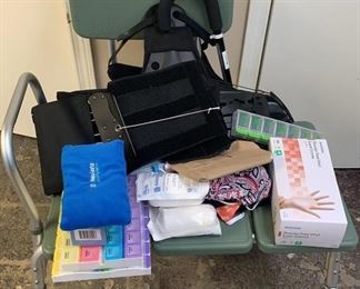 Lot 391 | MEDICAL SHOWER CHAIR, BRACES, CANE, & PILL
