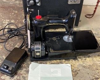 Lot 393 | VINTAGE SINGER PORTABLE ELECTRIC SEWING MACHINE
