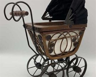 Lot 593 | AMERICAN HEIRLOOM WICKER BABY DOLL CARRIAGE
